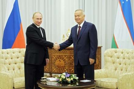 Путин поздравил Ислама Каримова с победой на выборах президента 