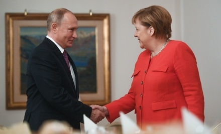 Владимир Путин и Ангела Меркель обсудили Украину, Сирию и Ливию