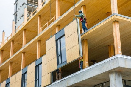 Минстрой анонсировал возведение в России деревянных многоэтажек